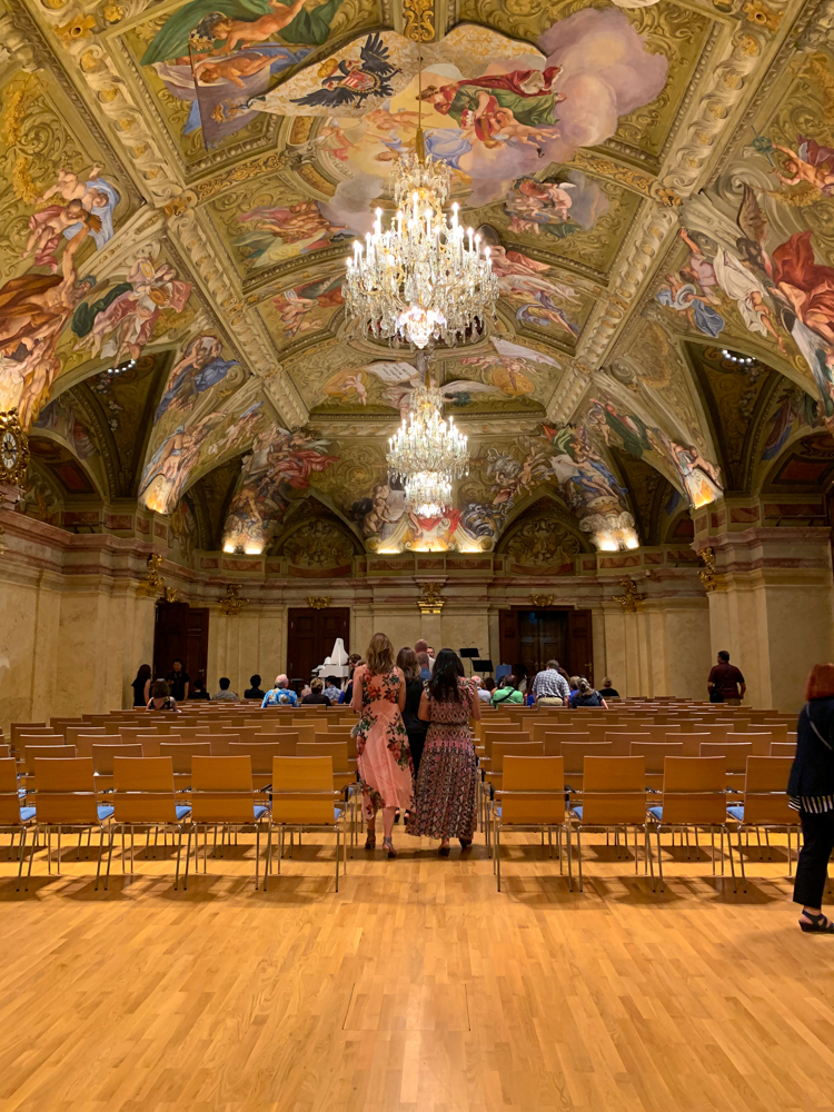 a colorful painted ceiling in a palace concert hall in Vienna