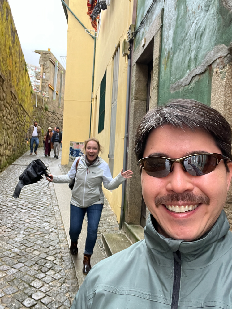 Pete and Rachelle walking through Porto