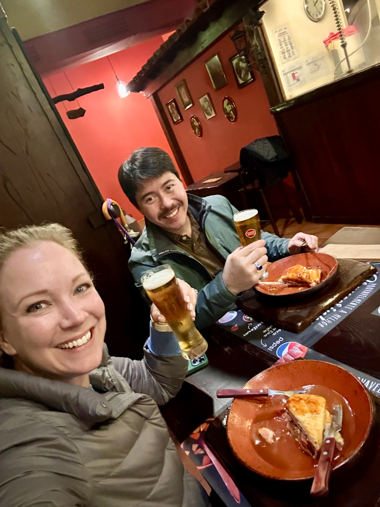 Rachelle and Pete at a pub in Porto