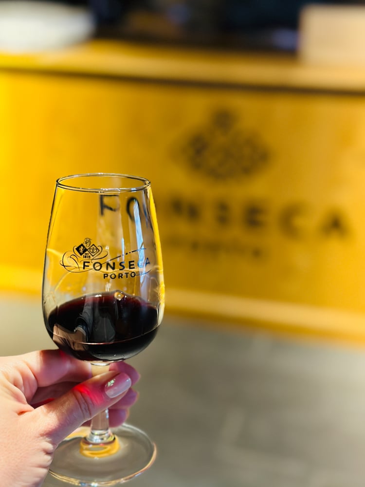 Sipping port wine.