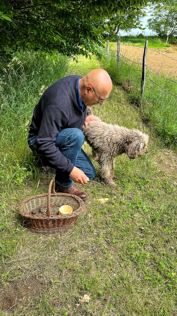 Truffle farmer with his dog in France