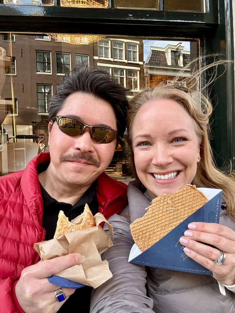 Rachelle and Pete enjoying a stroopwaffel and apple turnover