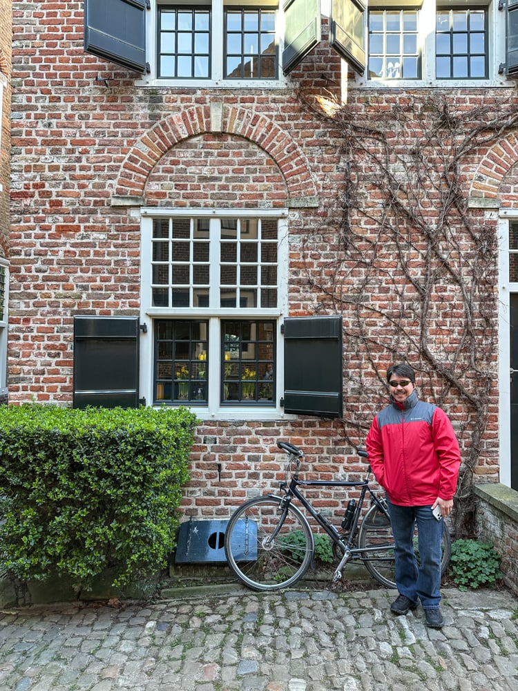 Pete standing next to a bike