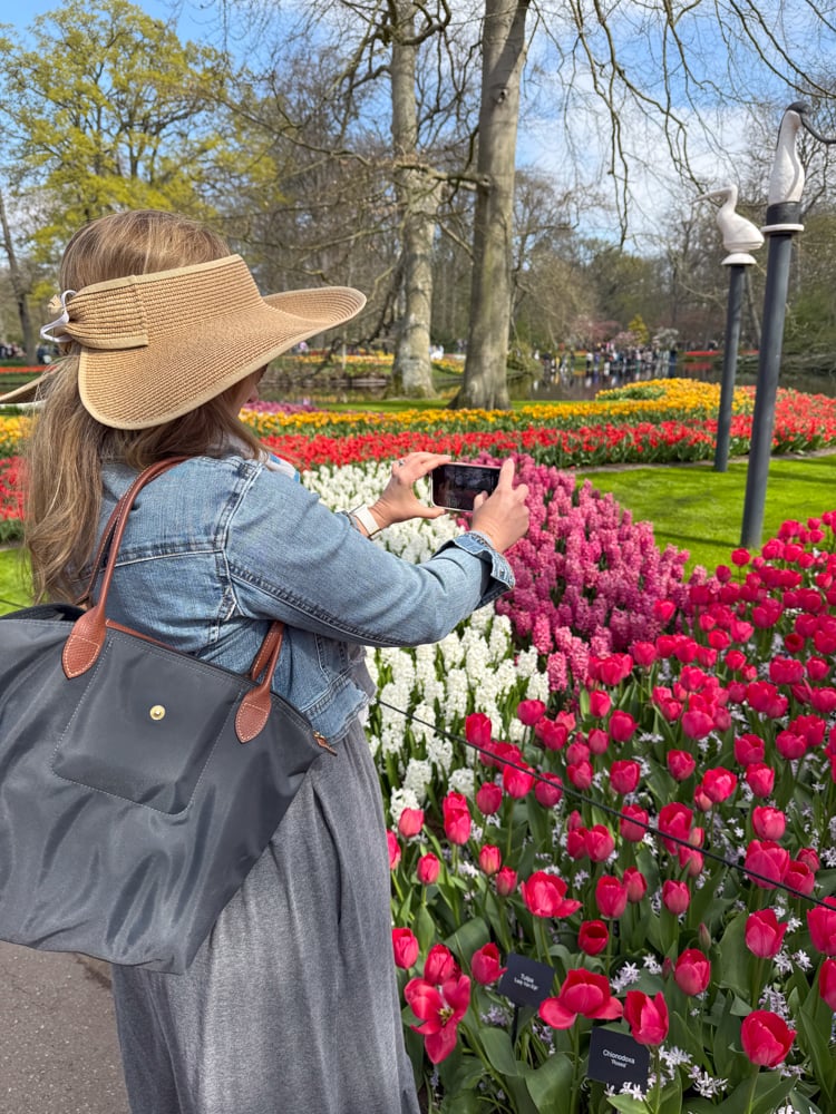 Rachelle taking photos of flowers
