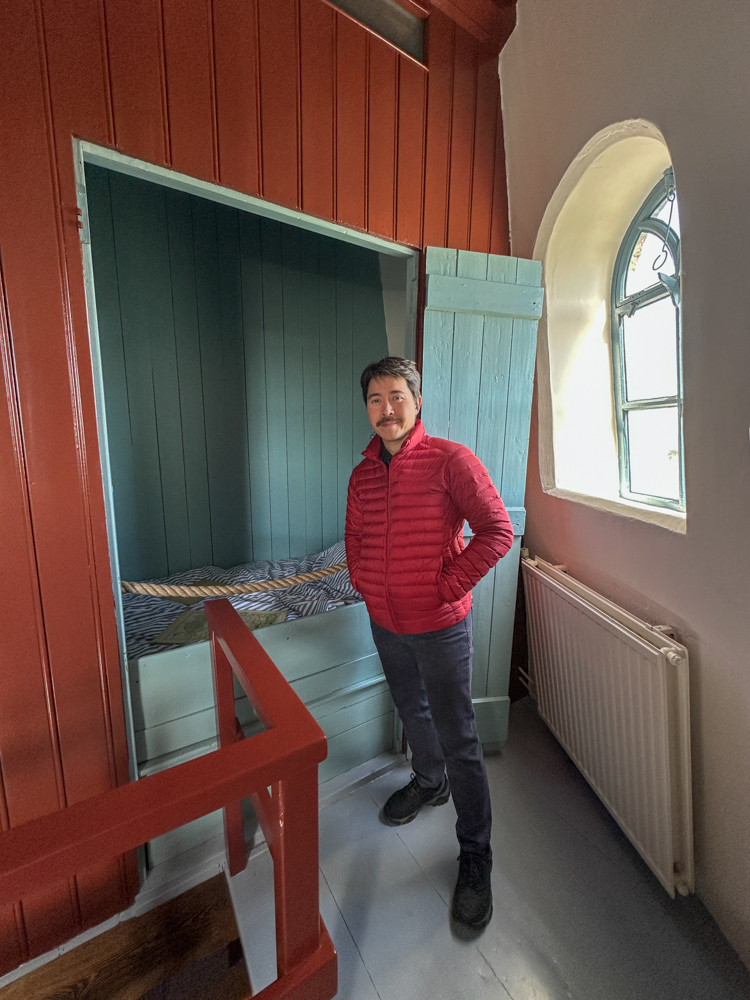 Pete standing next to a windmill sleeping cubby
