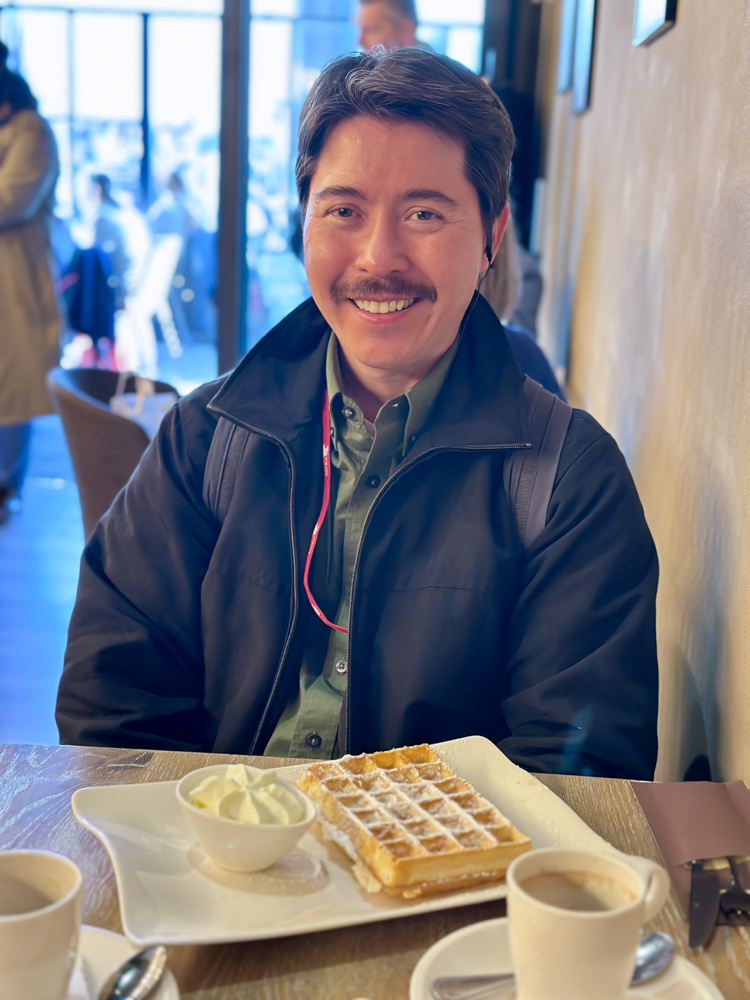 Pete with his coffee and Belgian waffle